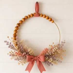 Wood Bead Wreath With a Dried Floral Accent